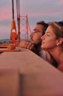 Admirando o pôr-do-sol do alto da ponte sobre o rio Madre de Dios, em Puerto Maldonado, na amazônia peruana